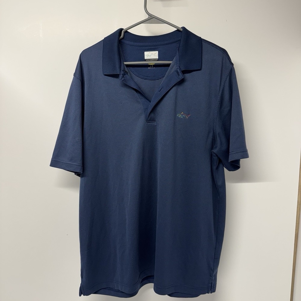 Greg Norman Play Dry men's performance golf polo shirt in size Large.